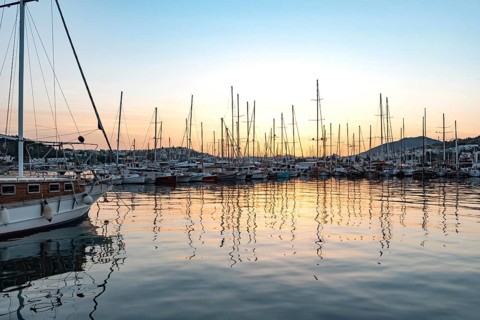 Bodrum, Turkey. April 23rd 2022 Beautiful sunset yachts moored in Bodrum Harbor, Turkish Aegean