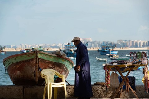 Alexandria, Egypt. December 1st 2022 An informal tourist souvenir stall beside a fishing boat on