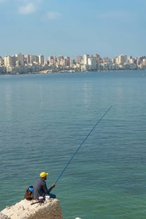 Alexandria, Egypt. December 1st 2022 A local fisherman on the Mediterranean coastal city of