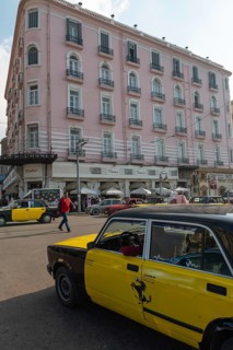 Alexandria, Egypt. December 4th 2022 A black and yellow Alexandria taxi in the street outside the