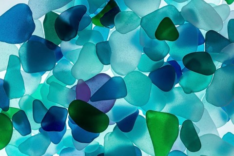 Mainly blue broken glass from the sea, sea glass, sea glass, beach glass from the North Sea