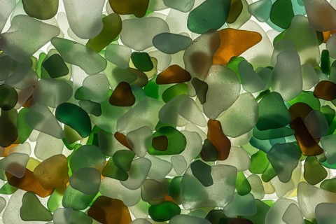 Colourful broken glass cut by the sea, sea glass, sea glass, beach glass from the North Sea