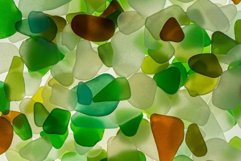 Colourful broken glass cut by the sea, sea glass, sea glass, beach glass, from the North Sea
