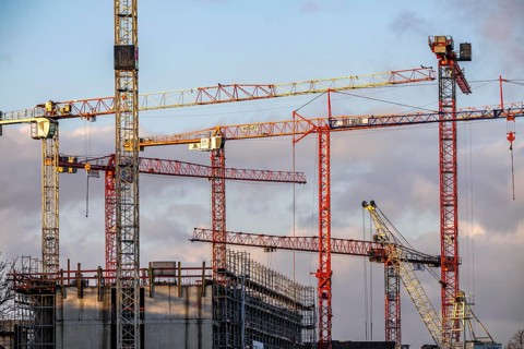 Construction cranes on 2 large construction sites Wohnbau, Geschäftsgebäude, Krefeld North