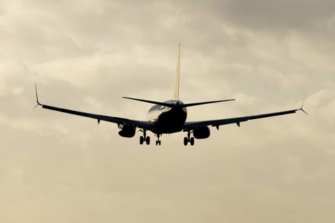 Boeing 737 commercial passenger airliner jet aircraft of Ryanair airways in flight on approach to
