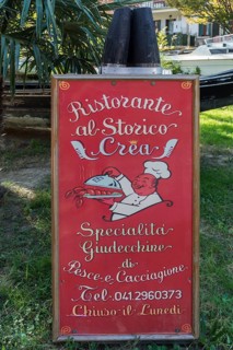 Advertising sign for a restaurant on the island of Giudecca, Venice, Veneto, Italy