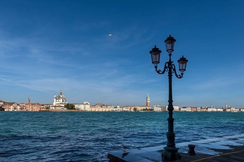 View of Santa Maria della Salute and the Campanile in Venice from Guidecca Island, Venice, Veneto,