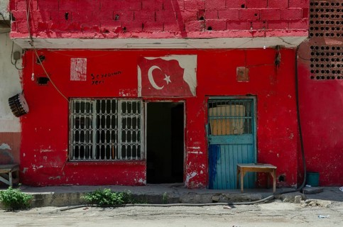 Adana, Turkey. 8th June 2014 Red painted workshop building in the Anatolian city of Adana, Turkey