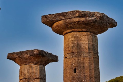 Temple of Hera, Temple of Hera, Heraion, Two ancient stone pillars against a clear blue sky,