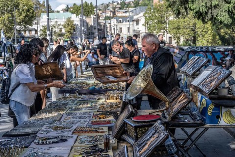 Tbilisi, Georgia. September 12th 2025. Street stall vendors and people shopping at the Dry Bridge