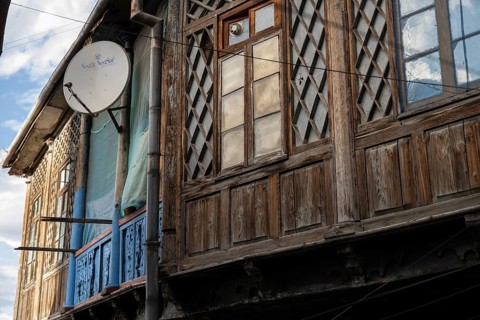 Tbilisi, Georgia. September 12th 2025. Typical old style Georgian wooden balconies on old houses in