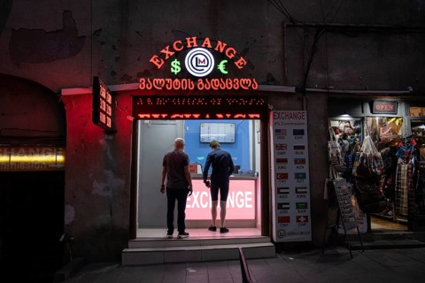 Tbilisi, Georgia. September 5th 2025. Foreign tourists changing money at a Georgian currency