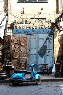 Cairo, Egypt. April 15th 2025. A cool looking blue Vespa style motor scooter, a popular mode of