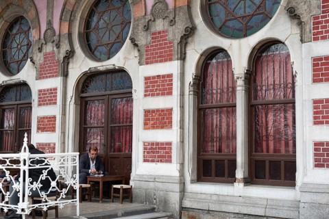 Istanbul, Turkey. January 3rd 2025. A man drinks tea in a café at the historical Sirkeci Railway