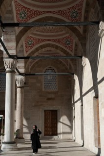 Istanbul, Turkey. January 3rd 2025. Muslim woman inside the ornate courtyard and newly restored