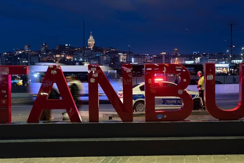 Istanbul, Turkey. January 3rd 2025. A busy road at night with a police traffic patrol in the