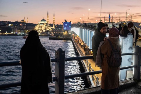 Istanbul, Turkey. January 3rd 2025. Tourists and locals gather at sunset on the iconic Galata