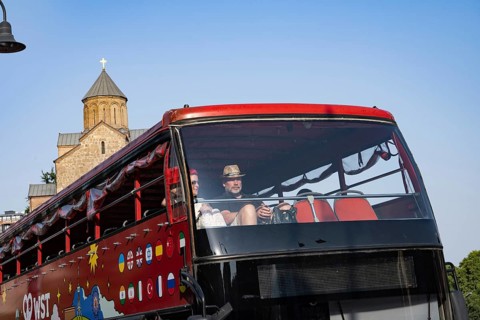Tbilisi, Georgia. July 29th 2025. Tourists on a double decker bus taking a sightseeing trip around