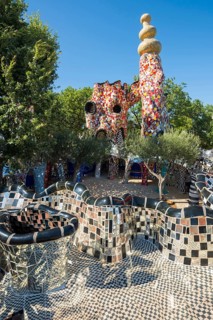 Colourful sculptures made of glass and mirrors, Giardino dei Tarocchi, Garden of Tarot, by Niki de