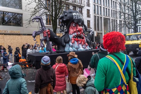 Rose Monday procession in Düsseldorf, theme car by wagon manufacturer Jacques Tilly, topic of mass