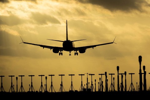 Boeing 737 commercial passenger airliner jet aircraft of Ryanair airways in flight on approach to