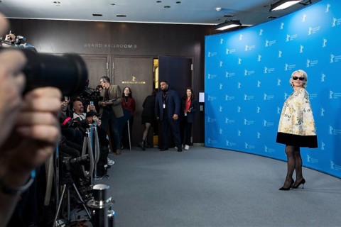 Pamela Anderson (actress) in front of photographers at a photocall for the film Rosebush Pruning at
