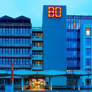 Main building of Bochum University with red BO logo in the evening, Central Campus, Bochum, Ruhr