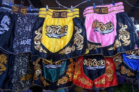 Mae Klong, Thailand. March 15th 2025. Muay Thai martial arts boxing shorts for sale as tourist
