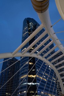 Bangkok, Thailand. March 26th 2025. Modern high rise office and condo buildings at night in Sathon