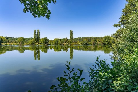The Angersee or Baiersdorfer Weiher in Baiersdorf, Upper Franconia, Bavaria, Germany