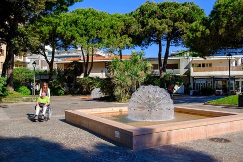 Pedestrian zone, fountain in the Marchesan park, Grado, Julian Friuli, Adriatic Sea, Italy