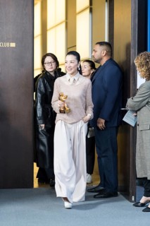 Michelle Yeoh with the Golden Bear arriving for the photocall at the Hyatt Hotel Berlin on 13.02
