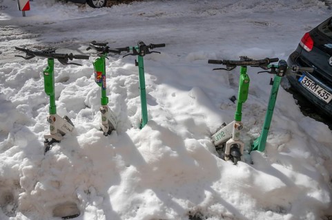 Parked, snow-covered scooters, Nuremberg, Middle Franconia, Bavaria, Germany