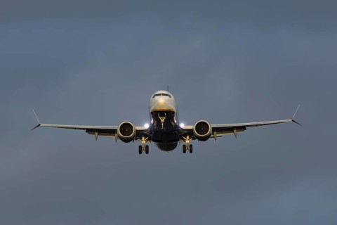 Boeing 737 commercial passenger airliner jet aircraft of Ryanair airways in flight on approach to
