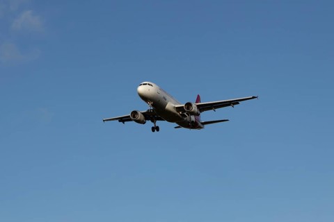Airbus A320 commercial passenger airliner jet aircraft of Electra airlines flying on approach to
