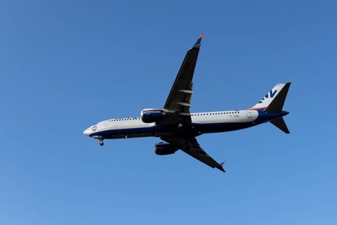 Boeing 737 commercial passenger airliner jet aircraft of SunExpress airways in flight on approach