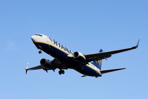Boeing 737 commercial passenger airliner jet aircraft of Ryanair airways in flight on approach to