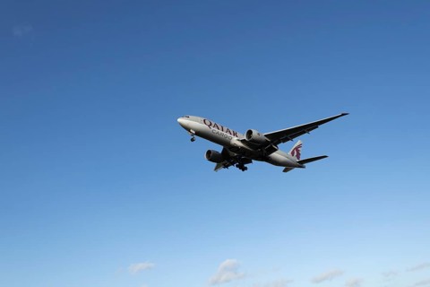 Boeing 777 A7-BFL commercial jet aircraft of Qatar cargo in flight on approach to land at London