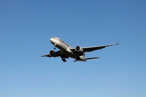 Boeing 777 commercial jet aircraft of Qatar cargo in flight on approach to land at London Stansted