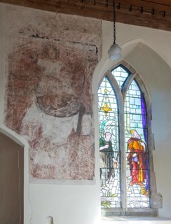 Medieval wall painting of Saint Christopher carrying the Christ child, church of Saint Mary,