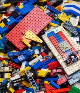 Assortment of unsorted Lego building bricks and construction items, children's toys, UK