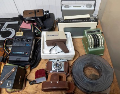 Display of film cameras, cine camera, transistor radios and other types of old analogue technology,