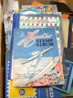 Stamps albums and stamp collection assembled in box, 1950s album with picture of Hawker Hunter RAF