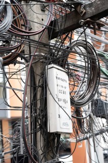 Bangkok, Thailand. March 4th 2025. A tangled mess of cables and wires used for phone and internet