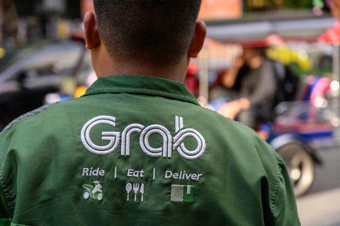 Bangkok, Thailand. March 25th 2025. A Grab food delivery service logo displayed on the shirt of a