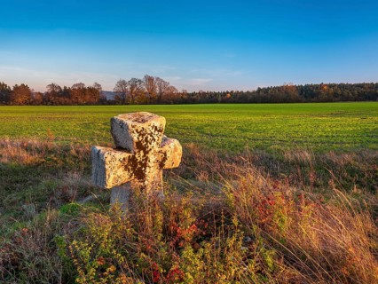 Medieval stone cross on the edge of the field in autumn, Sühnekreuz, Mordkreuz, Liebenstein,