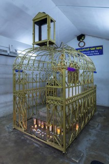 Tomb of Hasidic Rabbi Elimelech in a gilded grid at the Lezajsk Jewish Cemetery, Poland
