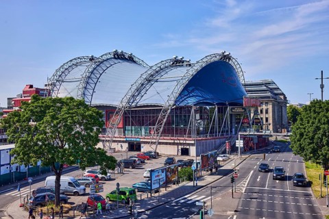 Musical Dome, large tent, road, general architecture, road markings lanes and stop line, cars,