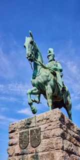 Emperor Frederick III, equestrian statue, sandstone pedestal, blue sky, cirrus clouds, Hohenzollern