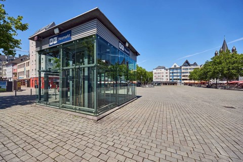 Underground car park, modern architecture, general development, paving stone square, trees, blue